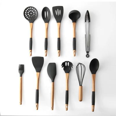 China 11pcs Silicone Cooking Kitchen Utensils Set, Wooden Handles Cooking Tool BPA Free Non Toxic Silicone Turner Tongs Spatula for sale