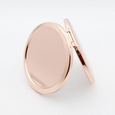 China Double Sided Folding Makeup Mirror 70mm Sublimation Compact Pocket Mirrors, Cosmetics Make Up Round Small Hand Mirror for sale