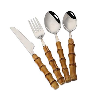 China Sustainable New Design Unique Shape Stainless Steel Bamboo Cutlery Set 304 Spoons Forks Knives Cutlery Set With Bamboo Handle for sale