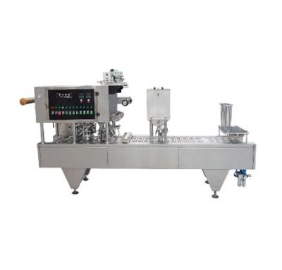 China Automatic Vegetable Liquid Milk Material Packing Processing Plant Soybean Filling Sealing Machine for sale