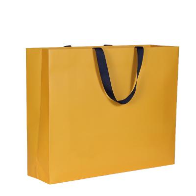 China Eco Friendly Customized High Quality Ribbon Handled Gift Paper Bag Luxury Packaging Bags for sale