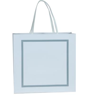 China Wholesale Eco Friendly Clothing Paper Bag Gift Shopping Bags With Logo Printing for sale