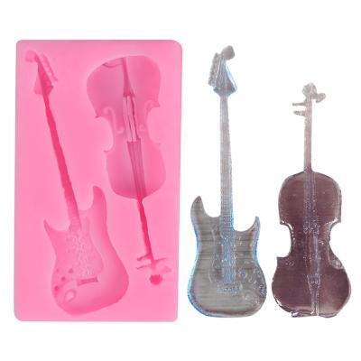 China DIY Tools Food Grade Cake Mold Silicone 2 Pcs Guitar Shape Disposable Chocolate Baking Mold for sale