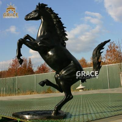 China Traditional Life Size Sculpture Cavalino Bronze Jumping Horse Statue for sale