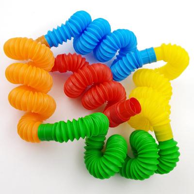 China DIY Sensory Toys Relaxing Plastic Tubes Sound Toys Sound Tubes Whistle Sensory Toys For Kids Stretch for sale