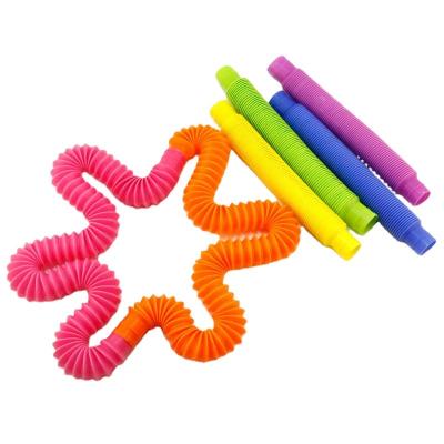 China Trigger Toys Plastic Sensory Stretch Tubes Colorful Sensory Pipe Toys Plastic Noise Stirring Person Noise Tube Toys For Kids Stir Tube for sale