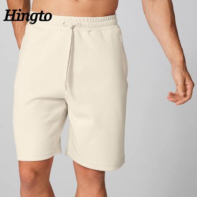 China Custom White Bright Colors Cotton Mens Breathable Clothing 4 Way Stretch Logo Men's Running Shorts Gym for sale