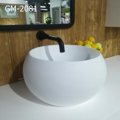 China Modern Counter Top Basin Sinks Resin Basin Solid Outdoor Round Hand Basin Small Wash Basin for sale