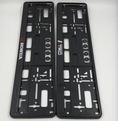 China Euro Style Popular Selling Black License Plate Frames Euro License Plate Holder With Car Brand Logo Printing for sale