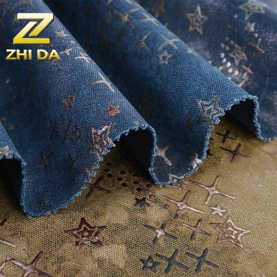 China Anti Static 16 Oz High Weight Star Profile Bronzed Film Coating Fabric For Tote Bags for sale