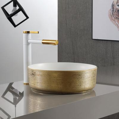 China Easy Clean Bathroom Decorative Creative Above Counter Basin Basin Luxury Gold Sink Black Colored for sale