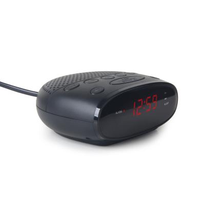 China New Design PORTABLE AM FM Radio Clock Travel Alarm Clock Mini Speaker aa OEM Pocket for sale