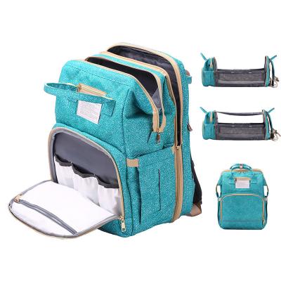 China Baby Diaper Bag Baby Crib Folding Diaper Bag Machine Mummy Shoulders Bag Waterproof Border Shoulders Bag Mother To Child Package for sale