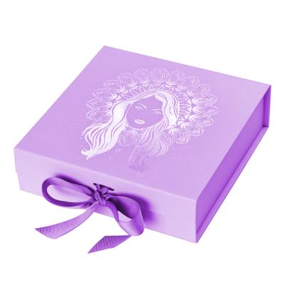 China Custom Handmade Logo Luxury Clothes Cosmetics Cardboard Packaging Gift Box Wrapping Paper Magnetic Folding Box With Ribbons Bow for sale