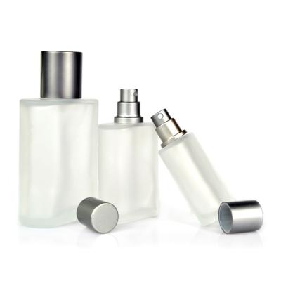 China Hot Sale 30ml 50ml 100ml Personal Care Square Shape Frosted Glass Perfume Bottle With Silver Gray Spray Pump for sale