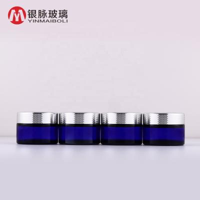 China Personal Care Skin Care Cream Jar 30ml Glass Blue Glass Cosmetic Jar With Custom Logo And Honeycomb Ring Lid for sale