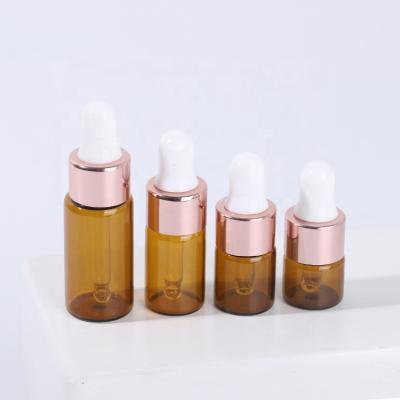 China Amber Clear Portable Personal Care Essential Oil Bottle With Eye Dropper Mini Empty Pipette Dropper Glass Vials for sale