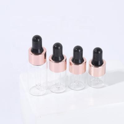 China Small Mini 3ml 5ml 6ml Amber Glass Vials Personal Care Clear With Rose Gold Dropper Bottle For Cosmetic Essential Oil for sale