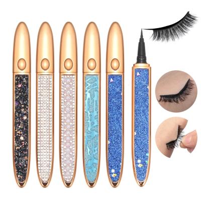 China 1 PC 2021 Self Adhesive 2 in 1 Lash Liner Glue Pen Non Magic Magnetic No Glue Pen Diamond Bling Glitter Liquid Eyeliner Waterproof Eyeliner for sale