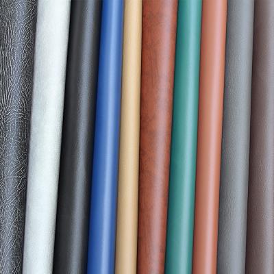 China Large Favorably Waterproof PVC Synthetic Leather Reclaimed Soft Leatherette Material Artificial Leather 12 Colors for sale