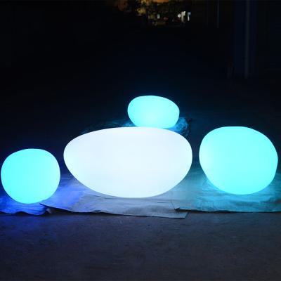 China Decorative & practice Co-exsit 2021 new arrive RGB rechargeable led stone light in garden light sitting led stone lights for sale