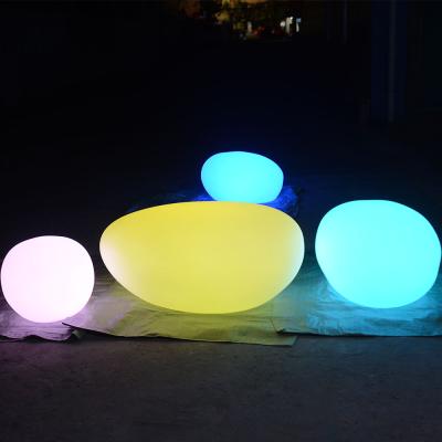 China Decorative & outdoor led solar co-exit party light resin stone light decoration led stone lights for sale