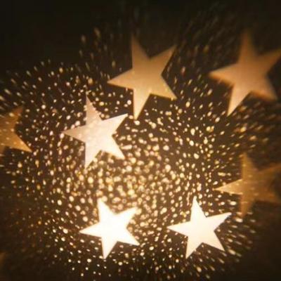 China Beautiful Christmas Tree Topper Lighted LED Tree Decorations LED Rotating Tree Star Top Projection Lamp for sale