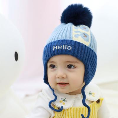 China Cute COMMON crochet knitted baby beanie hat COMMON with pom pom wholesale winter warm hood infant hat for toddler boy and girl for sale