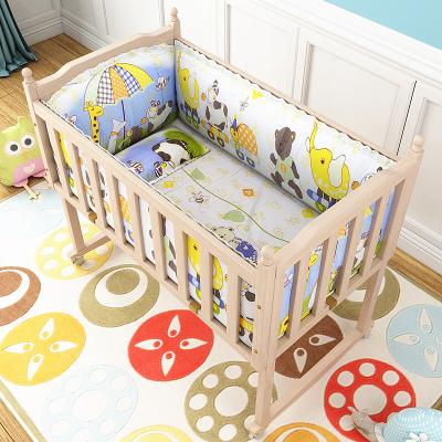 China Multifunctional Eco-friedly Bedside Sleeper Baby Carriage Hutch Baby Pack and Play Cribs for sale