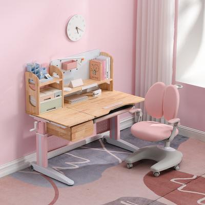 China Contemporary Lifting Wooden Study Desk Kids Ergonomic Kids Learning Table With Chair for sale