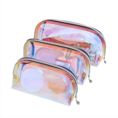 China Custom Logo Cosmetic Bag Holographic Women Holographic Waterproof TPU Stylish Clutch Cosmetic Bag for sale