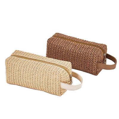 China Stylish Straw Makeup Pouch Bamboo Cosmetic Bag Latest New 2021 Fashionable Cosmetic Lady Bags With Handle for sale