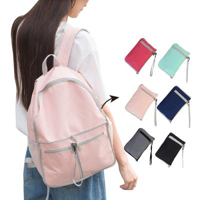 China Hot Selling Fashion Pink Polyester Backpack Waterproof Folding Girls Travel School Bag For Teenagers for sale