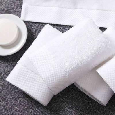 China Salão de beleza de cor simples Regalo Toalha de banho de algodão puro Suave e absorvente para adultos à venda