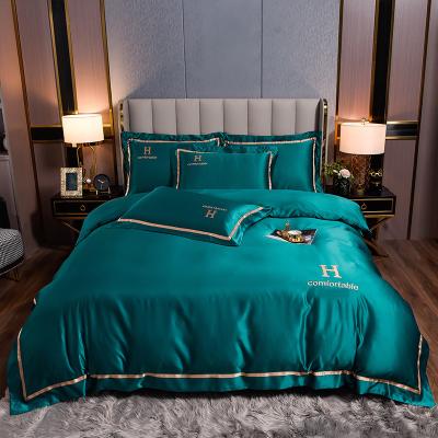 China Customized Logo Winter Embroidered Polyester Washed Silky Bedding Set for Solid Color for sale