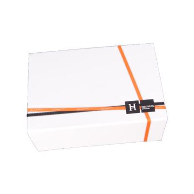 China Custom Matte White Magnetic Closure Paper Hot Stamping Gift Box For Clothes Ribbon Handle Rectangular Folding Apparel PackagingCus 56*35*20cm for sale