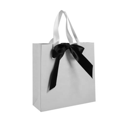 China Recyclable Wholesale Custom Printing Luxury Logo Gift Bag Elegant Shopping Bag With Ribbon for sale