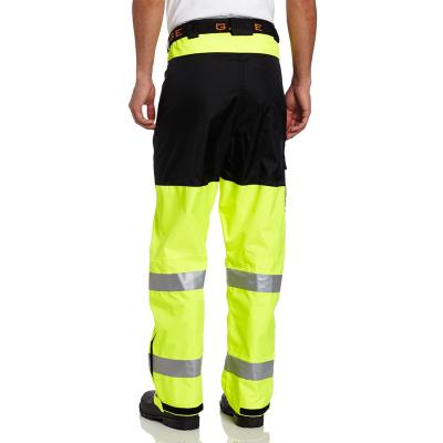 China High Quality Anti Shrink Neon Green Men Work Safety Pants With Reflective Tape And Pockets for sale