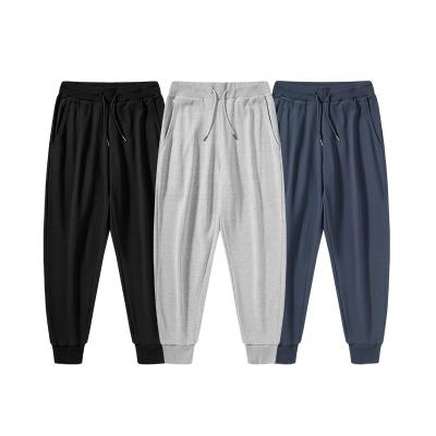 China Operating track pants of the anti-wrinkle logo gymnasium for men made on who for sale