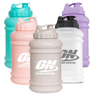 China Sustainable Half Gallon Water Bottle And Plastic Wholesale Gallon Water Jugs Candy 2.2L Colors for sale