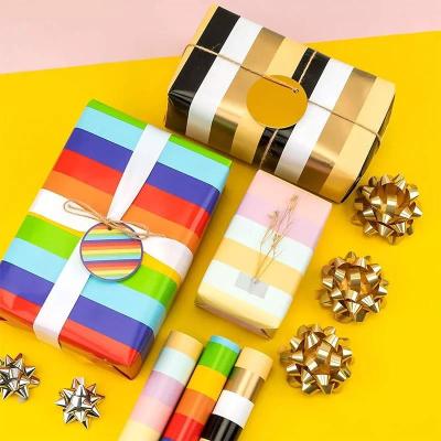 China Papel de regalo impreso ecológico - Sostenible y elegante tamaño personalizado en venta