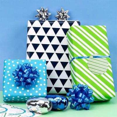 China Elegante impresión de papel de regalo de envoltura Impresión láser de patrones finos tamaño personalizado en venta