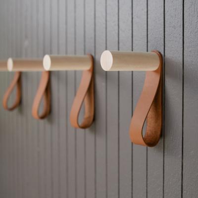 China Wall Mount Sustainable Creative Wood Peg Clothes Hanger Hooks With Leather Strap for sale