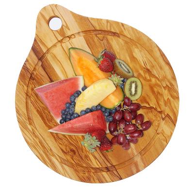 China Sustainable Customization Customized Natural Round Olive Wood Cutting Board for sale