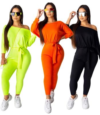 China New Hot-selling high quality fashion star shoulder QUICK DRY solid color oblique long sleeve overalls waistband one-piece overalls for sale