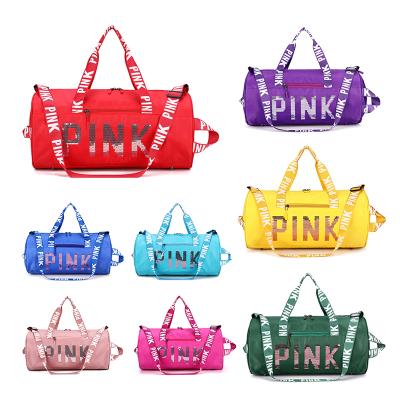 China 2022 hot selling high quality wholesale trending pink polyester gym duffel bag waterproof bag for women gym bag for sale