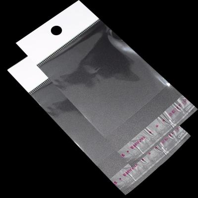 China Self Adhesive Transparent Opp Plastic Bag , 2mil / 0.05mm Stationery Gift Header Bags Packaging for sale