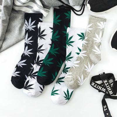 China Custom QUICK DRY custom made professional maple leaf colorful tube sports bangs weed leaf socks for sale