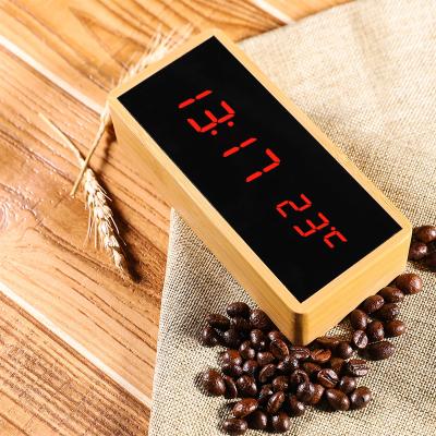 China Calendars Adjust Wooden Frame Bamboo Alarm Clock Table Clock Red Led Mirror Alarm Clock With USB Charger for sale