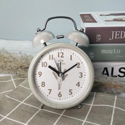 China Antique Style Children'S Bedside Clock Sound Large Round Alarm Clock Mute Alarm Clock for sale